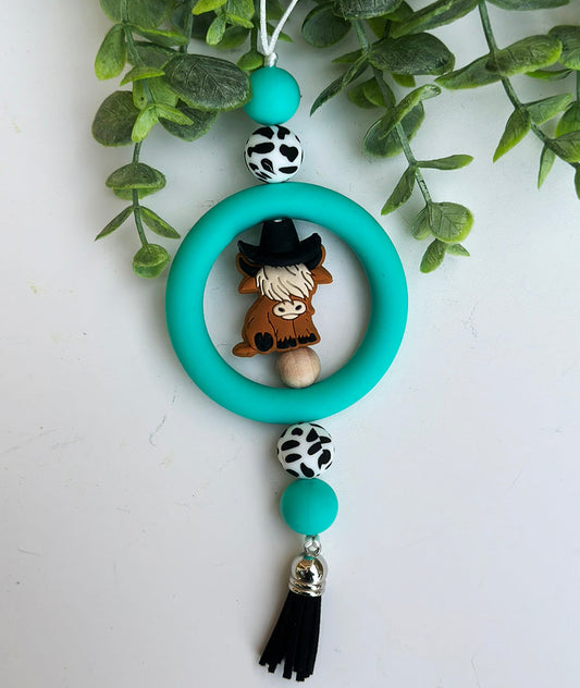 Turquoise Sitting Cow Car Charm